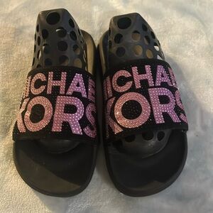 MK used black flip flops black size 3